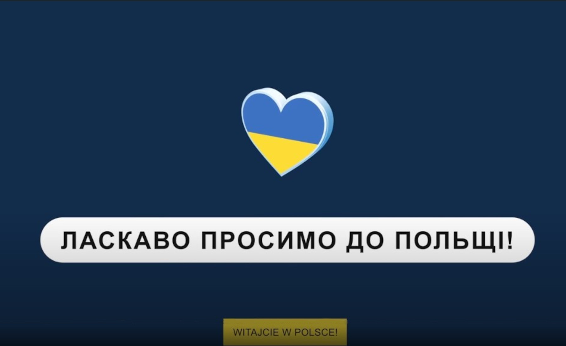 Serce w błękitno - żółtych barwach na granatowym tle.